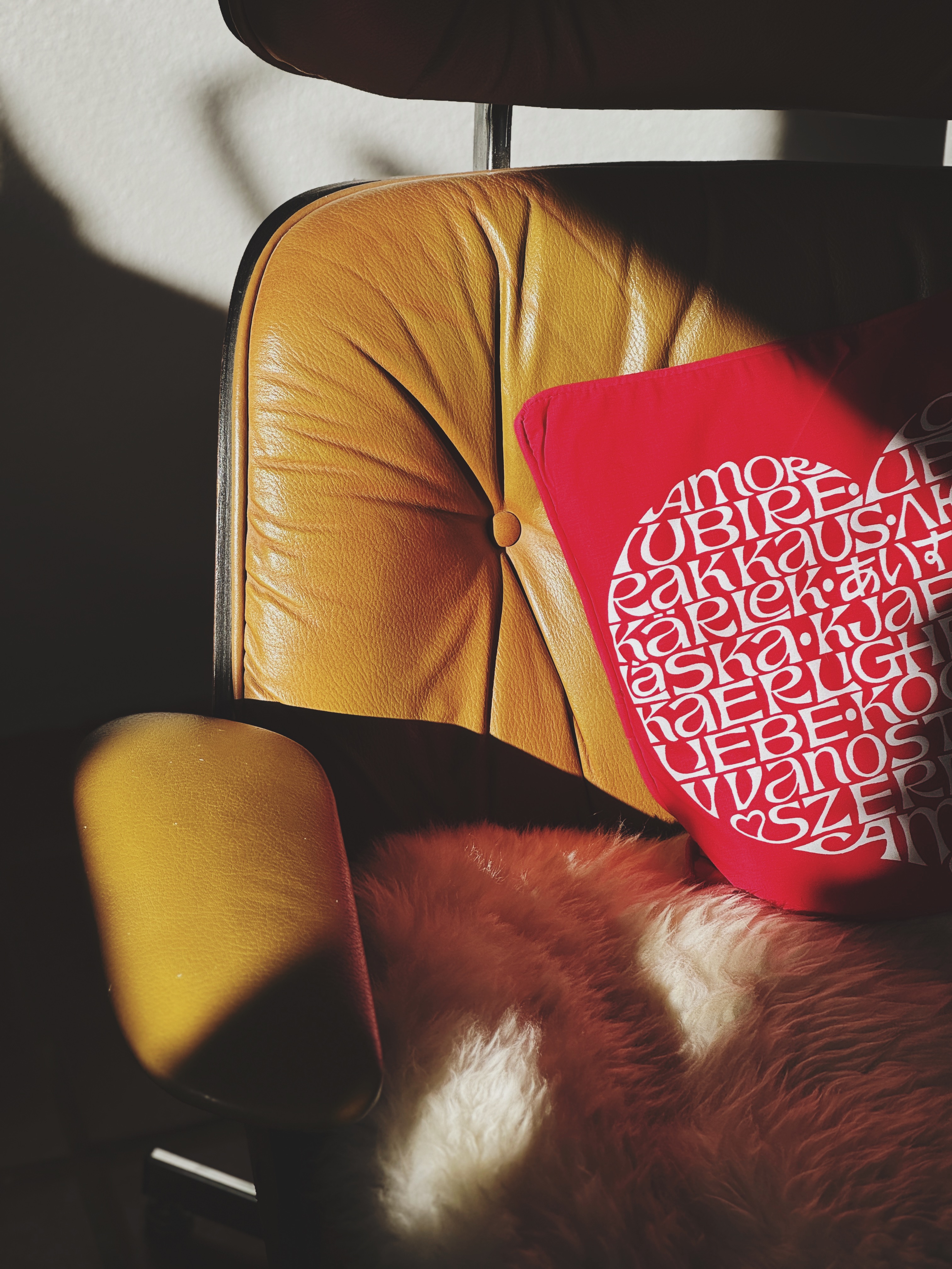 Eames chair with love pillow